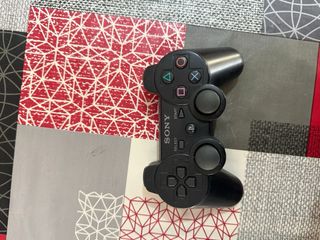 PS3 Super slim + 2 mandos + 2 juegos