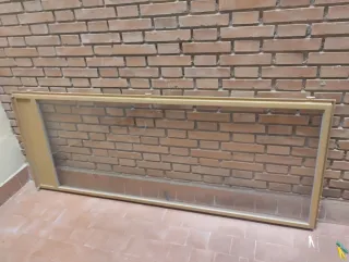 Puerta de cristal con marco