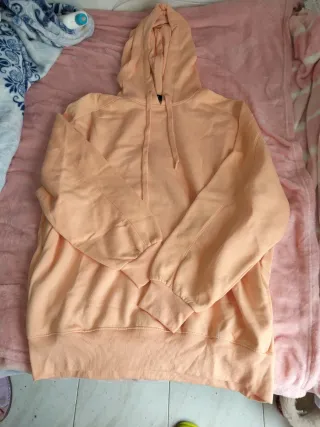 Felpa arancione pesca