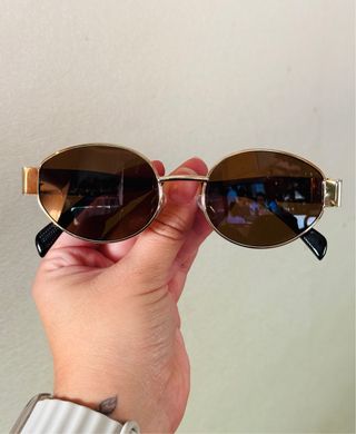 Gafas de sol ovaladas doradas y marrones