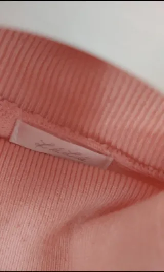 Dolcevita rosa ragazza