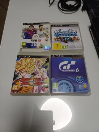 Consola PS3 nera + 4 giochi e accessori