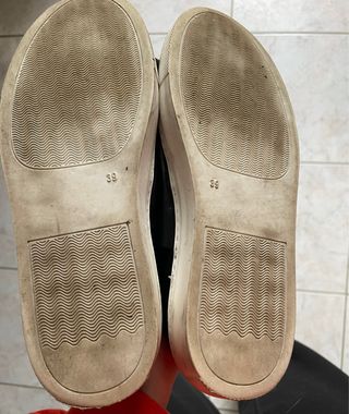 Scarpe nere in pelle con fiocco