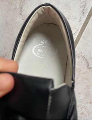 Scarpe nere in pelle con fiocco