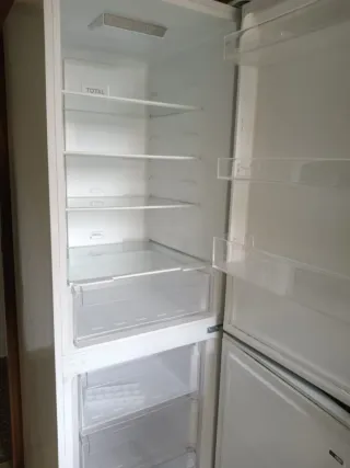 Lavadora Blanca Electrolux con pack nevera.