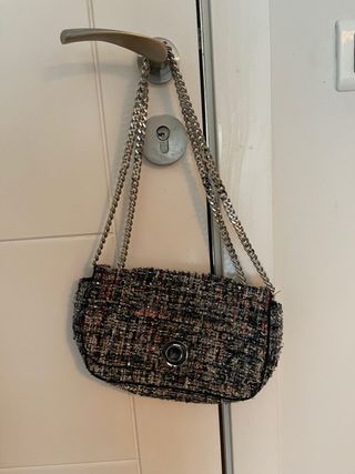 Bolso de mano tweed con cadena