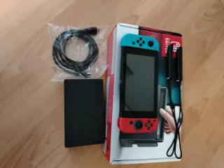 Nintendo Switch Azul/Rojo con caja