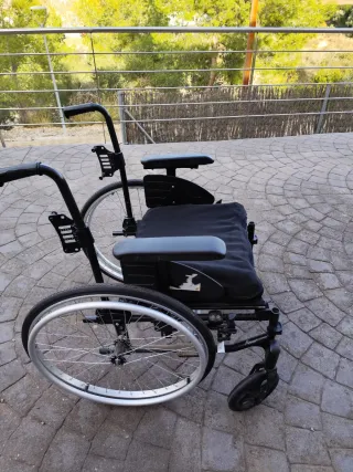 Silla ruedas anatómica plegable