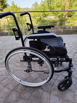 Silla ruedas anatómica plegable