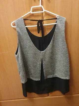 Blusa fiesta plateada y negra