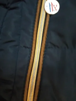 Chaqueta corta de plumas azul mujer