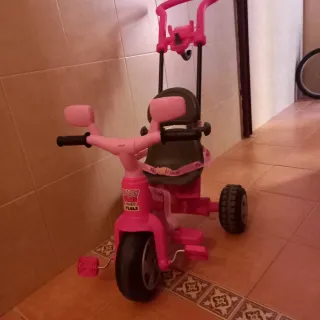 Triciclo adaptable rosa