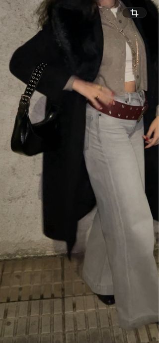 Bolso negro con tachuelas