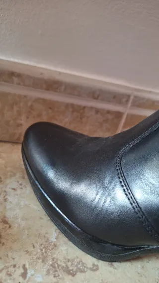 Botas altas de piel negras