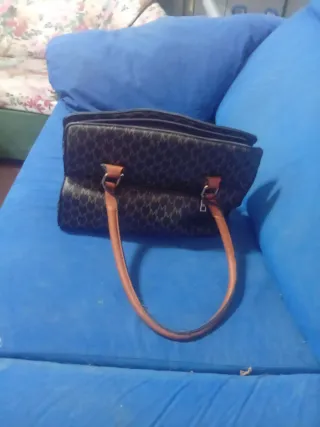 Bolso de mano con monograma