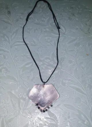 Colgante plata y negro