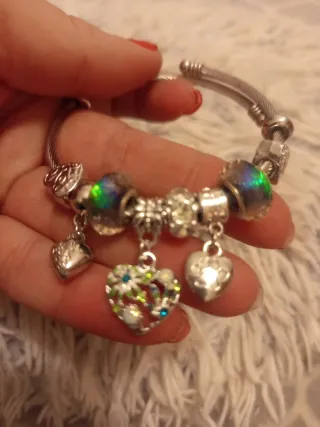 Pulsera de acero con charms