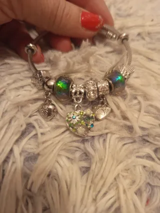 Pulsera de acero con charms