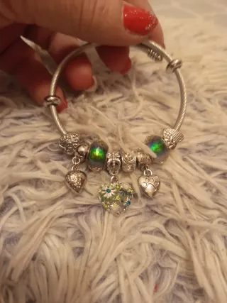 Pulsera de acero con charms