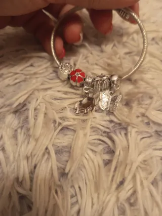 Pulsera de acero con charms