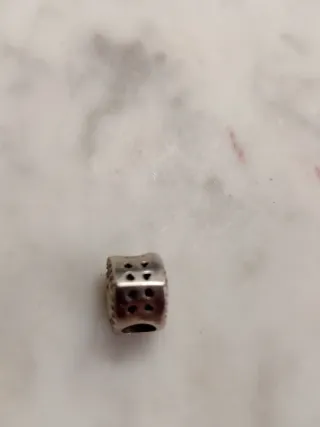 Pulsera plateada con charm corazón