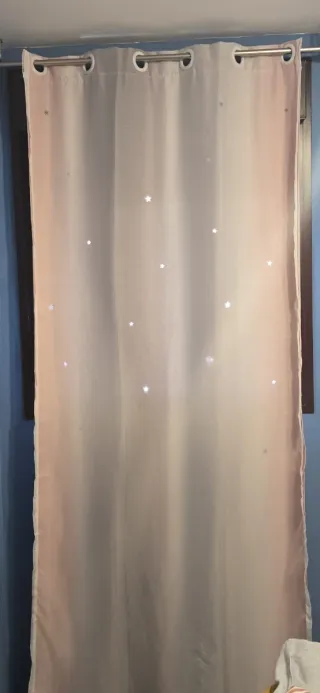 Barra extensible Leroy  y cortina de estrellas