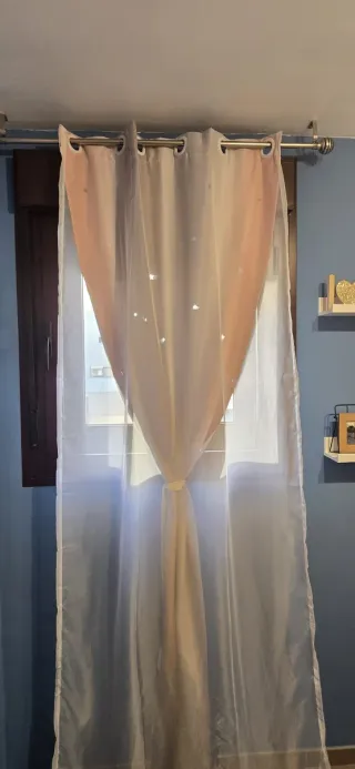 Barra extensible Leroy  y cortina de estrellas