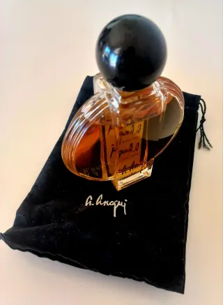 A. Hnequi Eau de Toilette Naranja y Negro