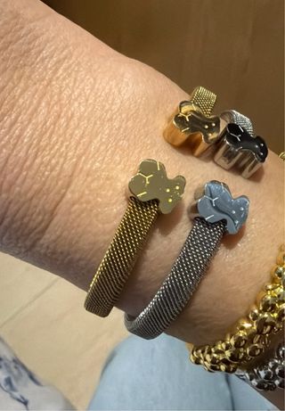 Braccialetti in acciaio con orso dorato e argento