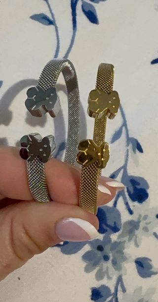 Braccialetti in acciaio con orso dorato e argento