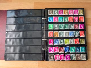 Álbum de sellos España + Suiza aprox. 400 sellos