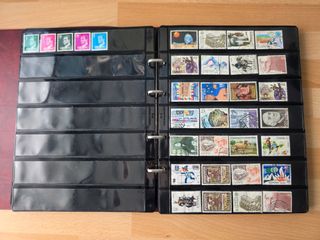 Álbum de sellos España + Suiza aprox. 400 sellos
