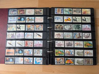 Álbum de sellos España + Suiza aprox. 400 sellos