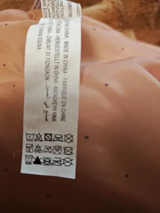 Abrigo de pelo sintético con capucha