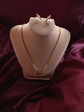 Conjunto de joyería oro y perlas