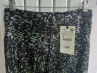 Pantalón bombacho Zara lentejuelas plata. Talla xs