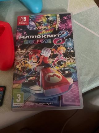 Nintendo Switch + Cuffie + 2 Giochi