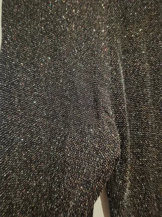 Pantalones campana metalizados negros y plateados