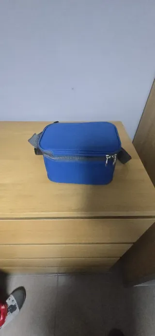 Bolsa térmica azul con 3 fiambreras