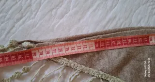 Chal de lana beige con flecos