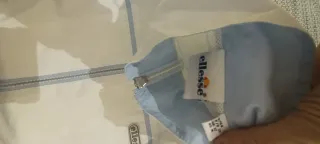 Chubasquero Ellesse blanco y azul