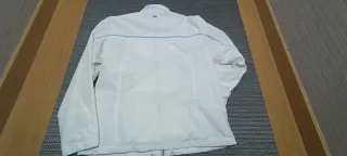 Chubasquero Ellesse blanco y azul