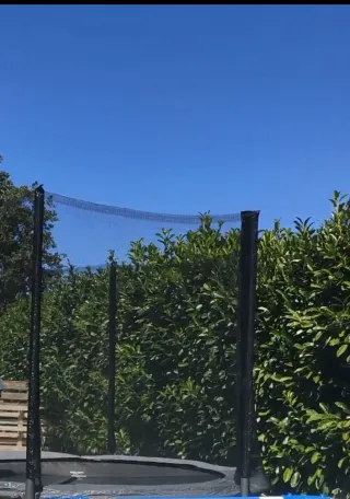 Cama elástica con red y cremallera