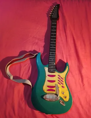 Guitarra de juguete musical infantil (no funciona)