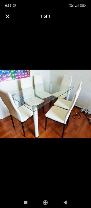 Tavolo in cristallo e 6 sedie grigie