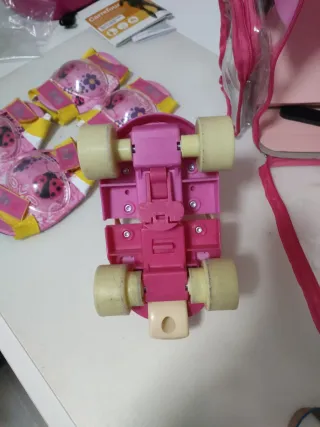 Patines niña rosa con casco, rodilleras y coderas