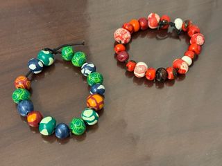 7 Pulseras étnicas bolas colores