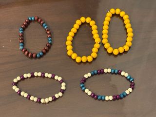 7 Pulseras étnicas bolas colores