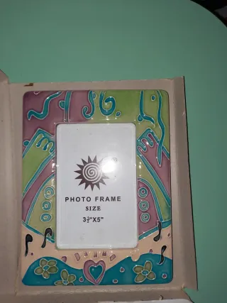 Cornice portafoto in ceramica