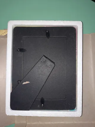 Cornice portafoto in ceramica